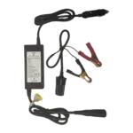 The Spirit 2 12V Charger includes a black power brick, input/output cables, red and black alligator clips, and a cigarette lighter socket connector—all for 12V charging on a white background. Oceans EV