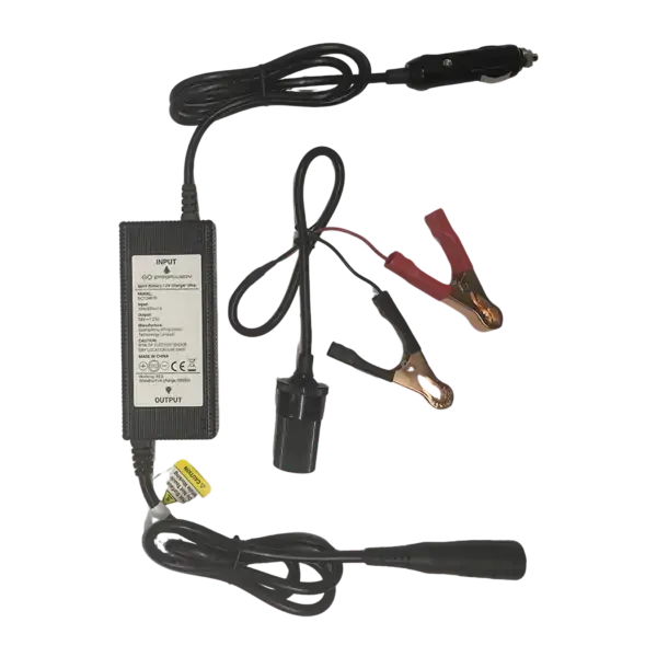 The Spirit 2 12V Charger includes a black power brick, input/output cables, red and black alligator clips, and a cigarette lighter socket connector—all for 12V charging on a white background. Oceans EV